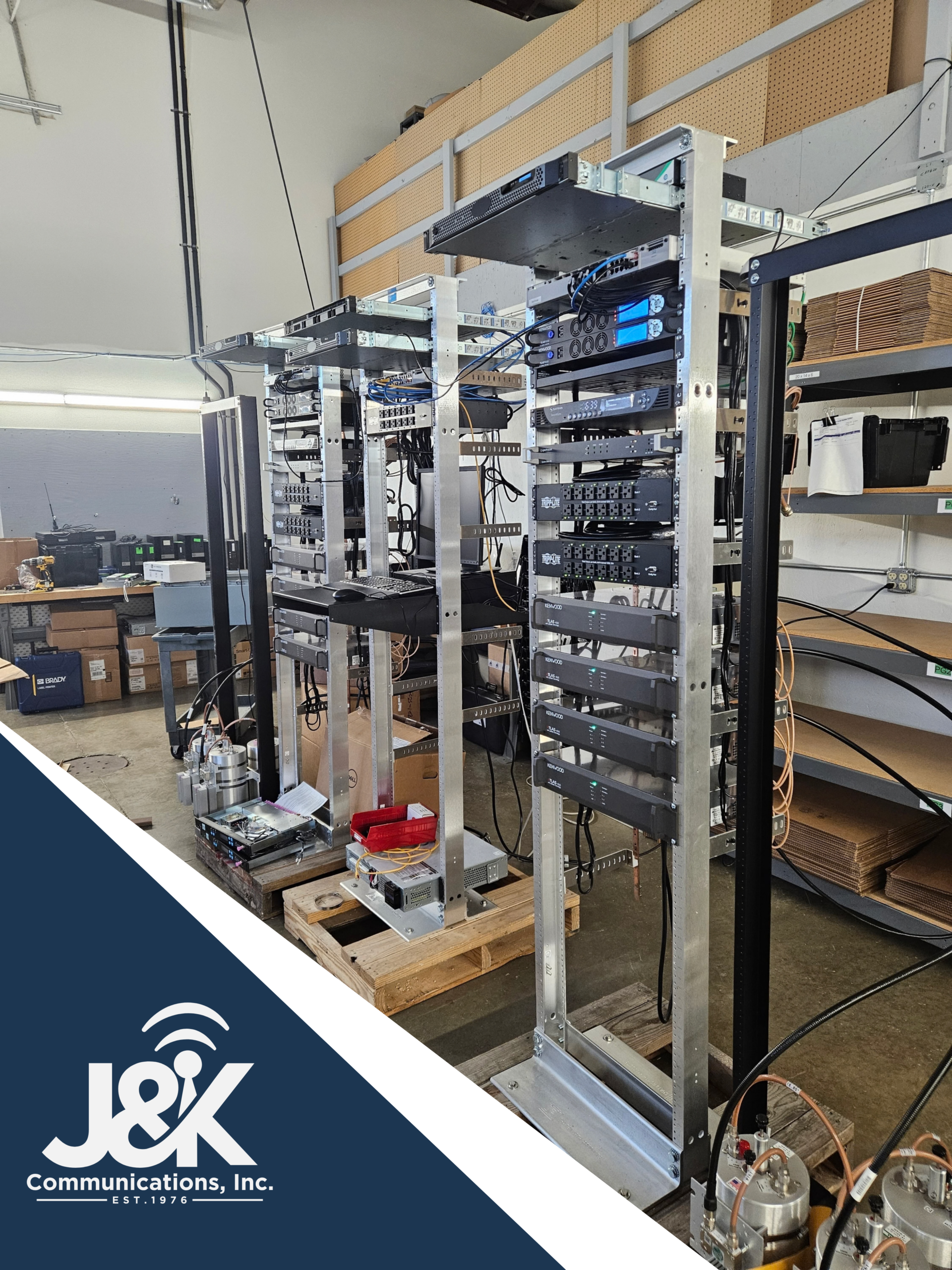 Atlas communications system racks staged with integrated equipment before field deployment
